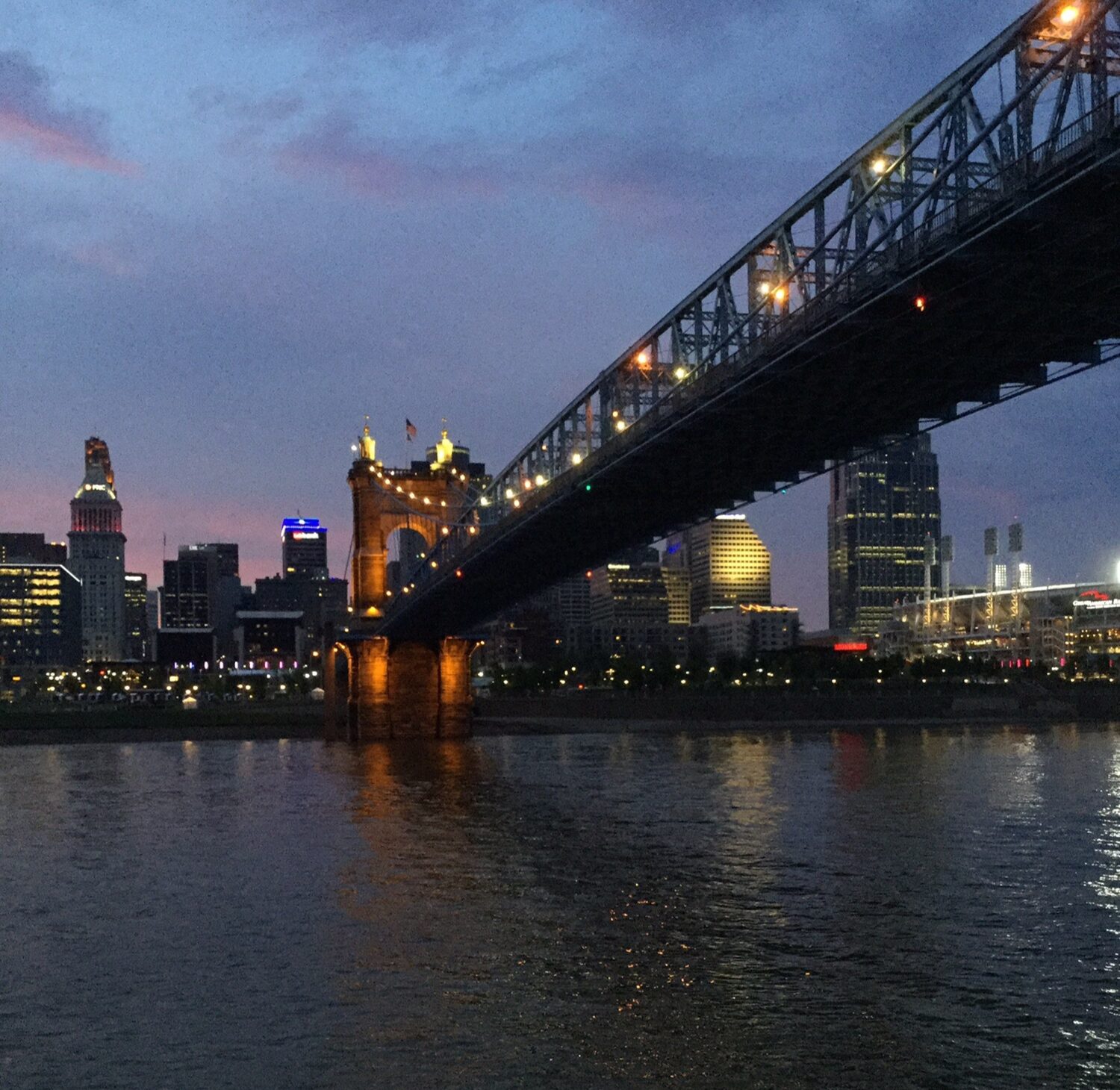 The Roebling Suspension Bridge and the Cincinnati skyline at dusk